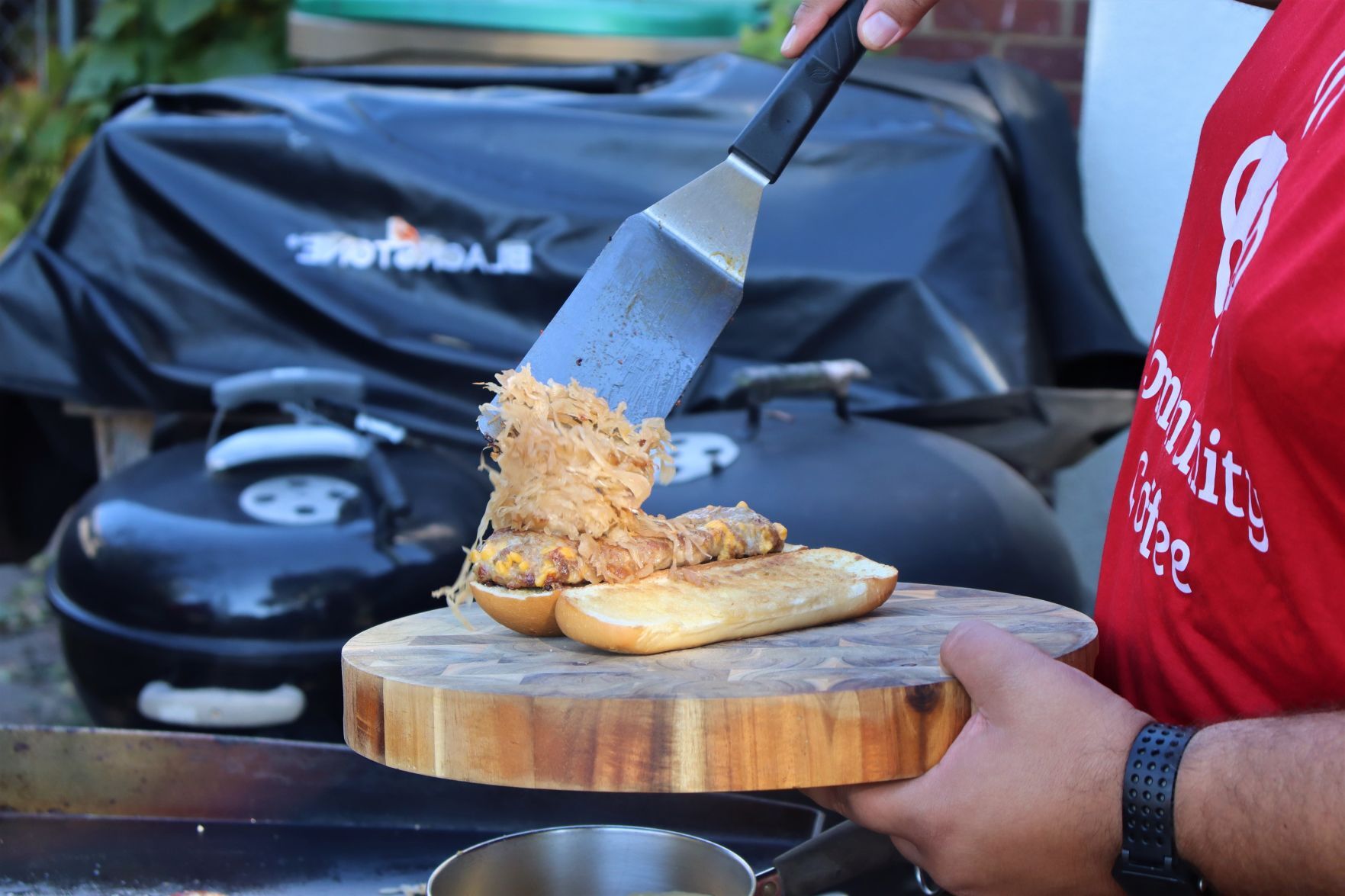 Blake Sykora preparing a Wisconsin cheese steak